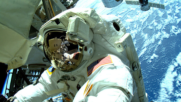 An astronaut on a spacewalk