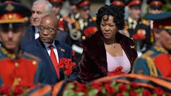 South African president Jacob Zuma and one of his four wives South African president Jacob Zuma and one of his four wives