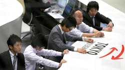 Nikkei traders at the end of day Nikkei traders at the end of day