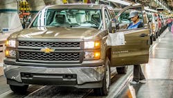 An employee at GM39s Fort Wayne Assembly plant inspects a Chevrolet Silverado as it comes off the assembly line An employee at GM39s Fort Wayne Assembly plant inspects a Chevrolet Silverado as it comes off the assembly line