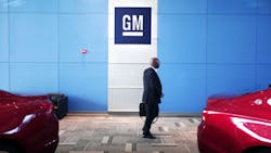 General Motors logo on a showroom floor General Motors logo on a showroom floor