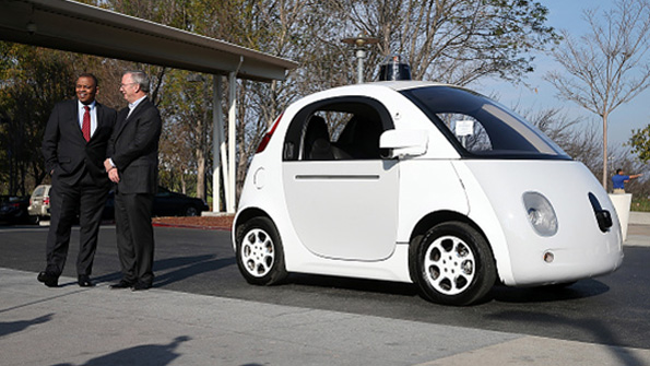 US Transportation Secretary Anthony Foxx and Google chairman Eric Schmidt