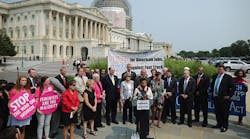 Democratic, women&apos;s rights and labor leader protested the Transpacific trade pact outside the Capitol today as the House anticipated a vote on giving President Obama authority to fast-track trade legislation.