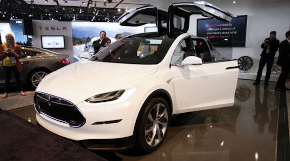A prototype of Tesla&apos;s Model X, shown here at the Detroit Auto Show in 2013.