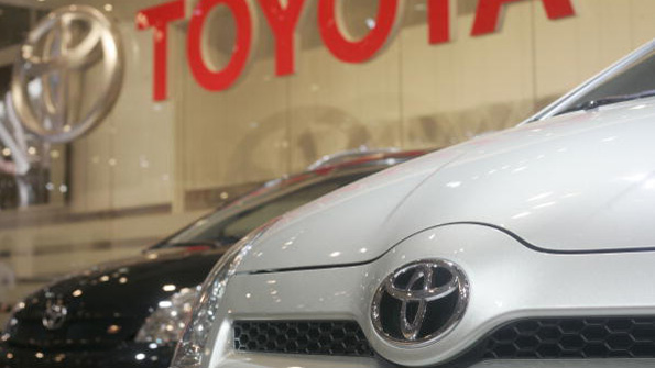A Toyoto car on the showroom floor