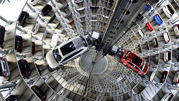 A brand new Volkswagen Passat and Golf 7 car are stored in a tower at the Volkswagen Autostadt complex near the Volkswagen factory in Wolfsburg Germany