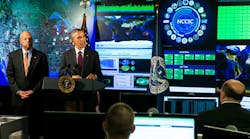 President Barack Obama, flanked by Secretary of Homeland Security Jeh Johnson, delivers remarks at the National Cybersecurity and Communications Integration Center earlier this year.