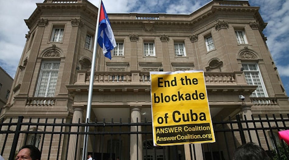 Cuban supporters gather on July 20 in front of their re-opened embassy in Washington, D.C. The embassy had been closed for 54 years since President Eisenhower severed diplomatic relations.
