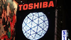 The Toshiba wordmark above a New Years Eve ball The Toshiba wordmark above a New Years Eve ball