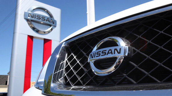 A Nissan vehicle grille on the lot