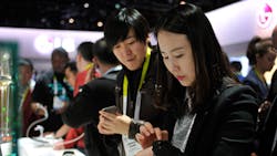 Consumer Electronics Show attendees check out the latest wearables Consumer Electronics Show attendees check out the latest wearables