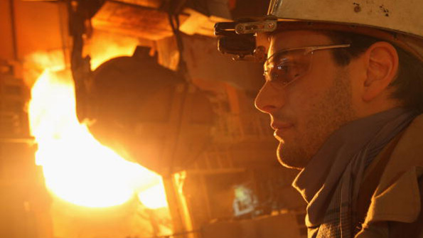 Molten iron flows into a furnace for purification and alloying at the ThyssenKru