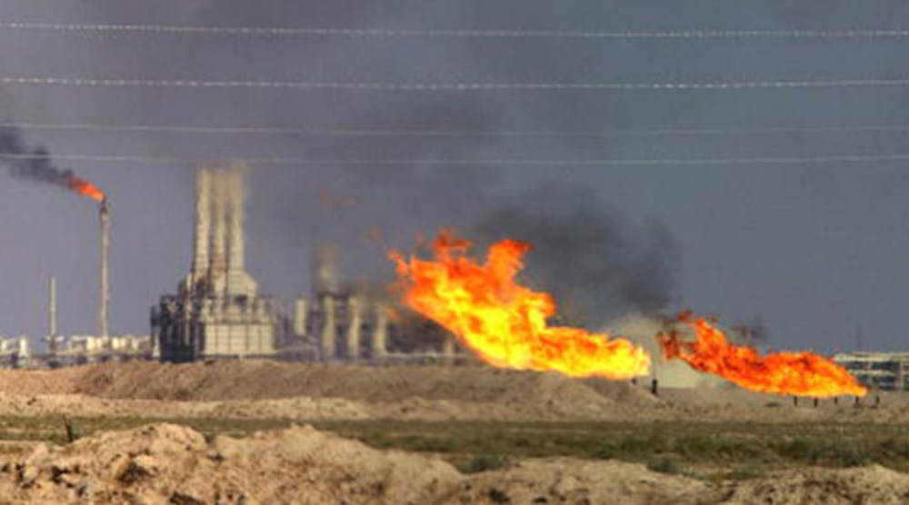 An oil refinery fire blazes in October 2002 in Iraq. Another refinery in that country has closed temporarily after a fire Monday.