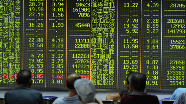 Investors observe stock market numbers Friday in Hangzhou China