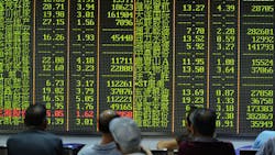 Investors observe stock market numbers Friday in Hangzhou China Investors observe stock market numbers Friday in Hangzhou China