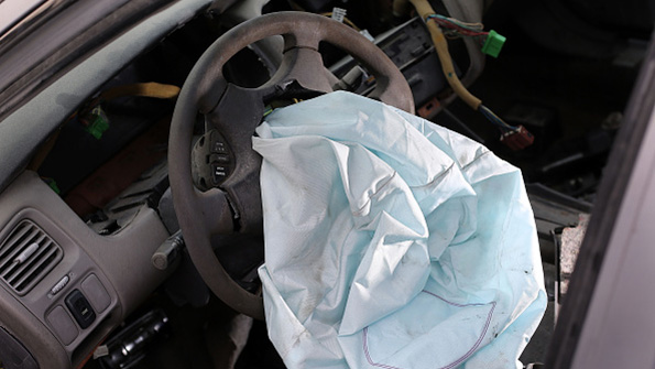 A deployed airbag in a 2001 Honda Accord
