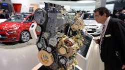 A visitor looks at a Citroen diesel engine during the 2013 IAA show in Germany A visitor looks at a Citroen diesel engine during the 2013 IAA show in Germany