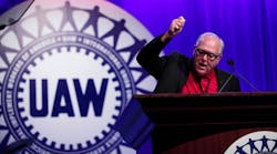 UAW president Dennis Williams speaks at the quadrennial UAW Special Convention on Collective Bargaining earlier this year in Detroit. The UAW&apos;s current contract with the Big Three will expire at 11:59 p.m. Tuesday.