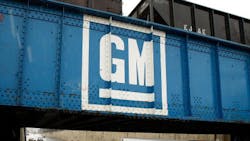GM logo painted on a train bridge GM logo painted on a train bridge