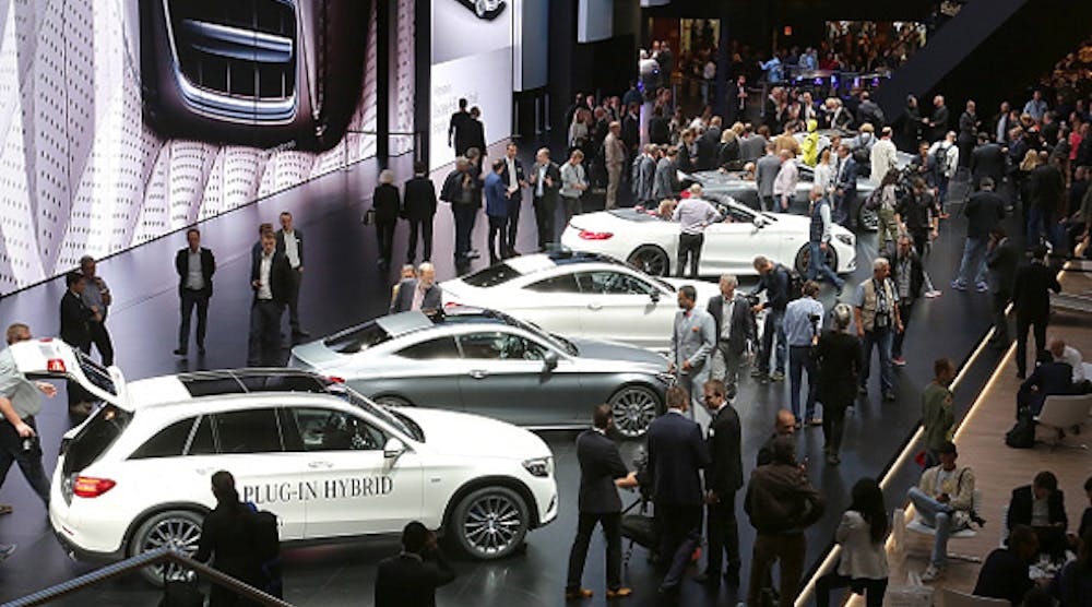 IAA Auto Show attendees mill about new Mercedes models on display. The show will open to the public Saturday and connected cars (and the hackers who want to break into them) are a hot topic.