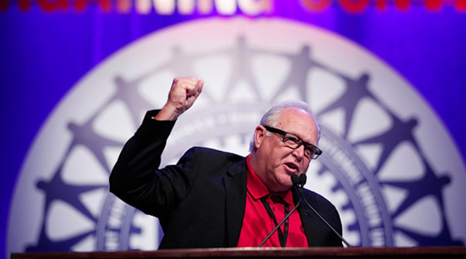 United Auto Workers president Dennis Williams speaks at a special convention earlier this year. The UAW negotiated a major new contract with the U.S. arm of Fiat Chrysler that should transform its workers&apos; compensation.