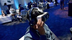 Attendees test the first consumer version of the Samsung Gear VR at Oculus 2 Connect Developers Conference in Hollywood, California.