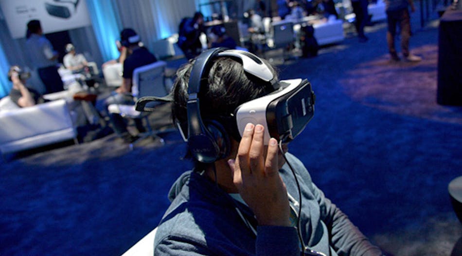 Attendees test the first consumer version of the Samsung Gear VR at Oculus 2 Connect Developers Conference in Hollywood, California.