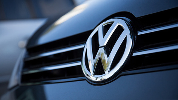 The Volkswagen logo on an auto grille