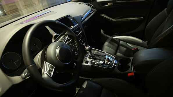 The interior of an Audi outfitted with Delphi driverless technology