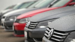 Volkswagen cars lined up on a lot Volkswagen cars lined up on a lot