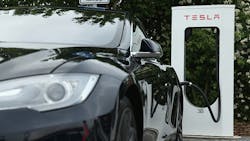 A Tesla Model S at a recharging station A Tesla Model S at a recharging station