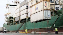 A container ship is loaded at Port Everglades Florida A container ship is loaded at Port Everglades Florida