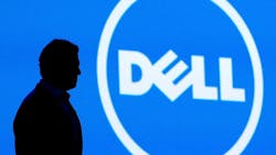 Dell CEO Michael Dell stands in front of his companys logo Dell CEO Michael Dell stands in front of his companys logo