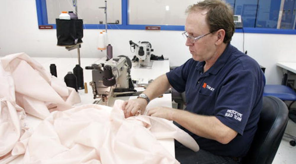 A Takata employee sews an airbag at the company&apos;s crash-testing facility in Auburn Hills, Michigan.