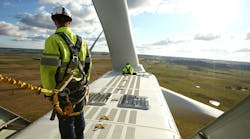 Vestas service technicians work on a wind turbine in Taralga, Australia.