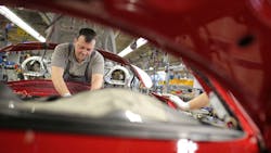 Workers at a Porsche plant Workers at a Porsche plant