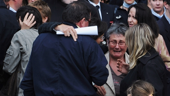 Relatives of passengers on Air France39s flight 447 mourn outside Notre Dame Cathedral after a memorial service for the victims of the Air France air crash on June 3 2009 in Paris France Many people look at how the Air France PR team managed this tragedy as a textbook approach