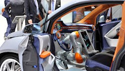 Autonomous car on display at a tech show Autonomous car on display at a tech show