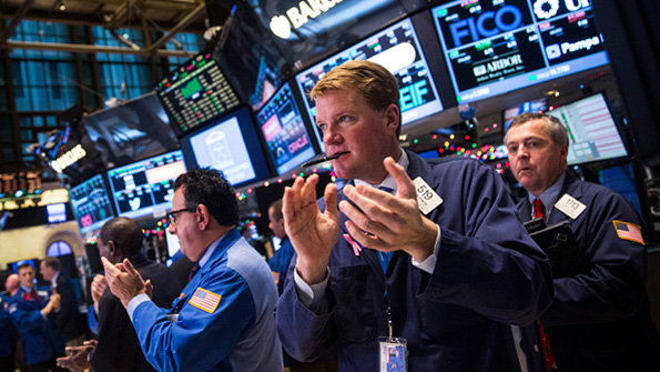 Traders on the floor of the NYSE