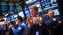 Traders on the floor of the NYSE Traders on the floor of the NYSE