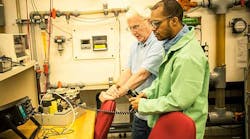 Joseph Dent, right, an apprentice in ArcelorMittal's Steelworker for the Future program. Joseph Dent, right, an apprentice in ArcelorMittal's Steelworker for the Future program.