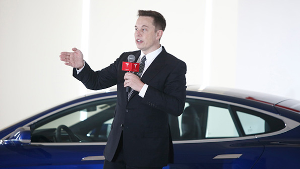 Tesla Motors chairman CEO and product architect Elon Musk speaks in Beijing