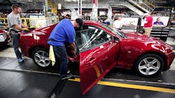 GM workers polish off another 2016 Chevy Camaro at the Lansing Mich plant GM workers polish off another 2016 Chevy Camaro at the Lansing Mich plant