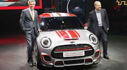 Peter Schwarzenbauer (L), member of the board of management at BMW AG, and Jochen Goller, senior vice president of MINI sales posed with the MINI John Cooper Works Concept car at the 2014 Detroit Auto Show.