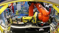 A Kuka robot installs a dashboard at the MercedesBenz factory in Sindelfingen A Kuka robot installs a dashboard at the MercedesBenz factory in Sindelfingen