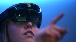 A Microsoft employees shows off HoloLens at the companys developer conference A Microsoft employees shows off HoloLens at the companys developer conference