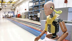 A crash test dummy sits in a Michigan testing facility A crash test dummy sits in a Michigan testing facility