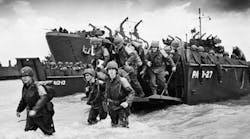 U.S. troops move ashore at Omaha Beach, June 6, 1944. The Normandy Invasion involved 156,000 Allied troops, against more than 50,000 Axis defenders. The American, British, Canadian, and French troops, with various others, successfully landed and captured five beachheads on the Atlantic Coast, starting the advance on Germany that ended World War II in Europe 10 months later.