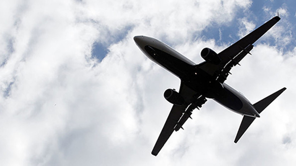 An airplane flies over Raleigh North Carolina