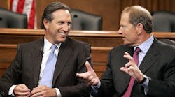 Honeywell CEO David Cote, right, talks with Starbucks CEO Howard Schultz during a Capitol Hill event designed for business leaders and lawmakers to discuss challenges.